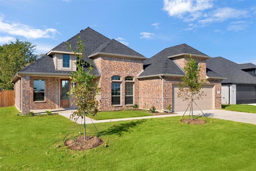 Front exterior of a new home in , Italy, TX, highlighting curb appeal (Image 23).