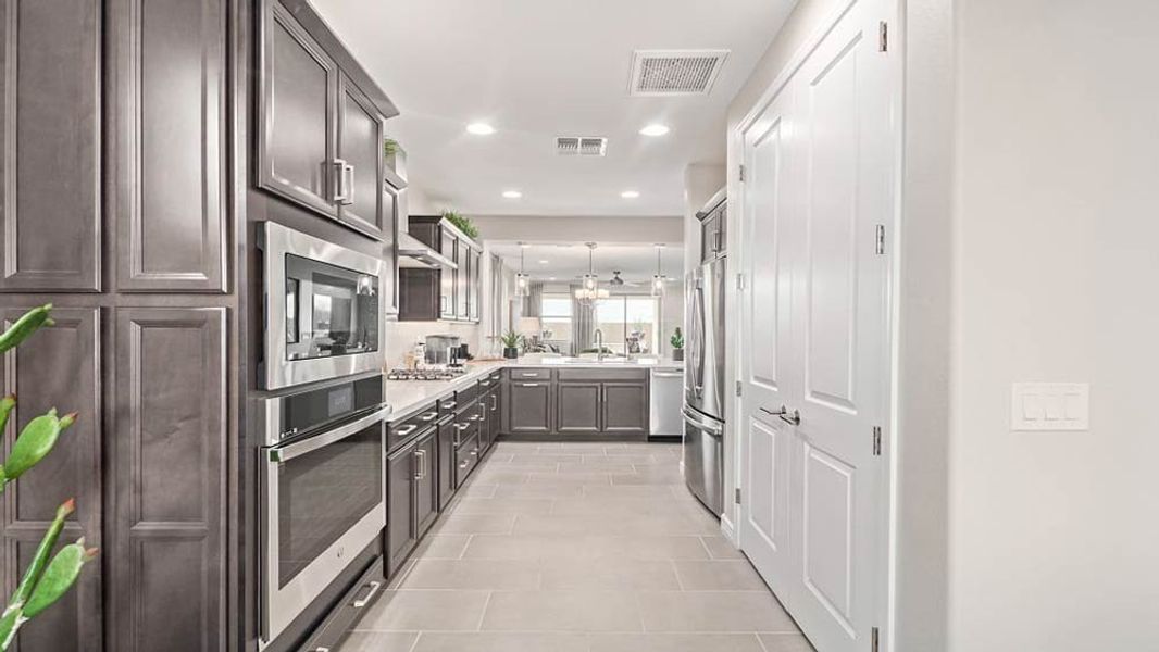 Representative furnished interior of a home built from the Hudson by Taylor Morrison in Paradisi Encore Collection, Surprise (Image 5). Representative furnished interior of a home built from the Hudson by Taylor Morrison in Paradisi Encore Collection, Surprise (Image 5).