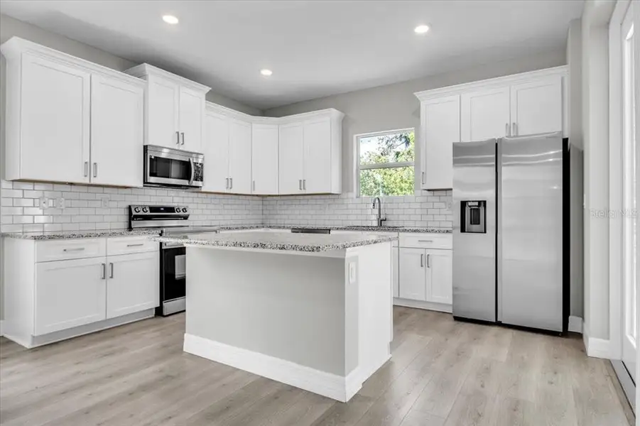 Furnished interior view inside a new home in , Punta Gorda (Image 9).