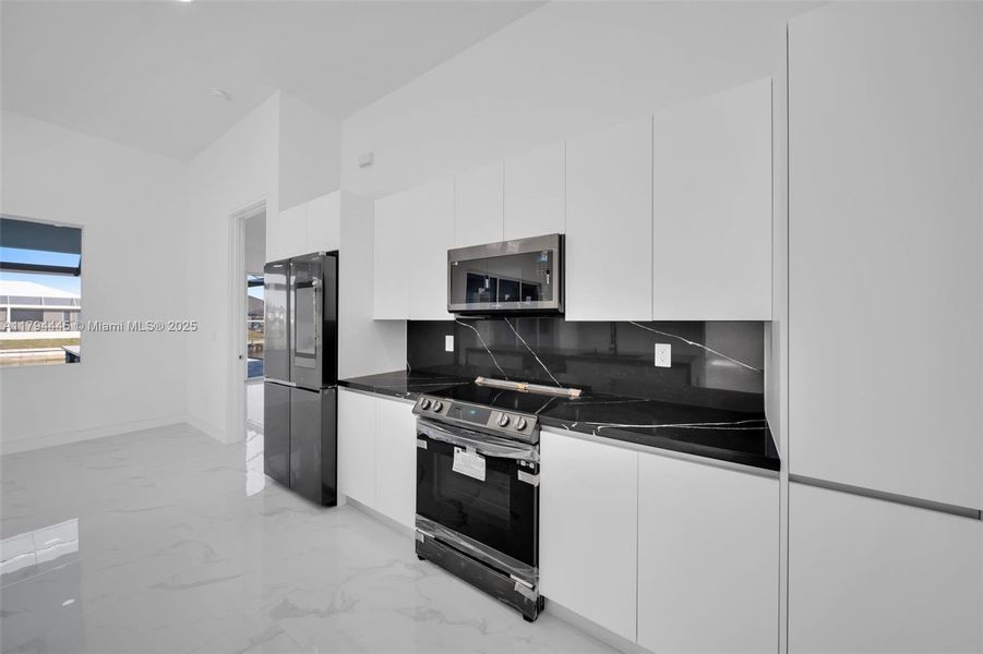 Furnished interior view inside a new home in , Cape Coral (Image 7). Furnished interior view inside a new home in , Cape Coral (Image 7).