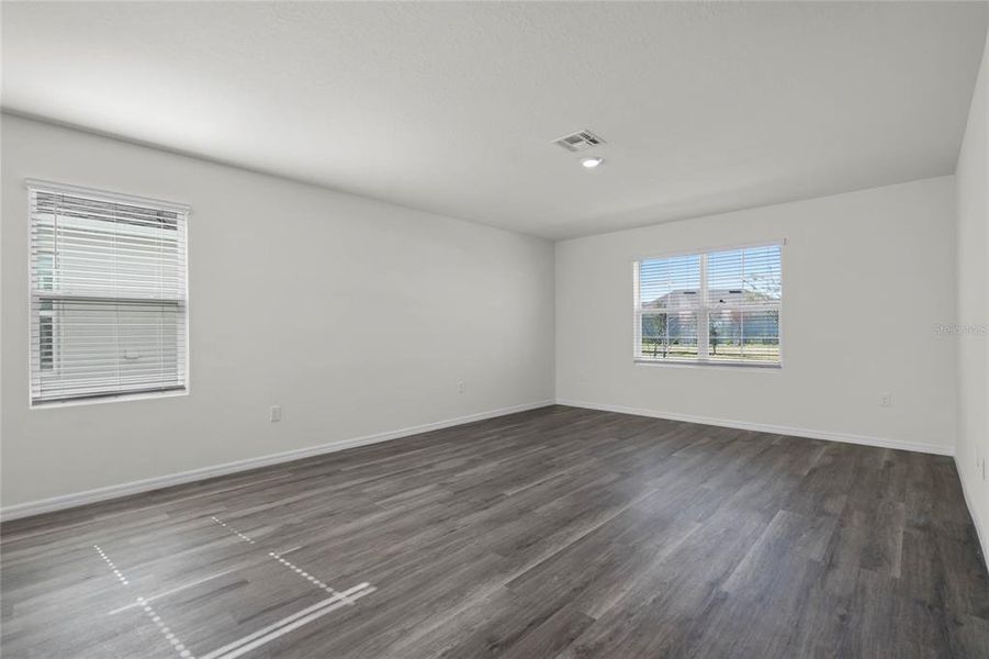 Spacious, unfurnished interior of a new home in Harmony at Lake Eloise, Winter Haven (Image 26). Spacious, unfurnished interior of a new home in Harmony at Lake Eloise, Winter Haven (Image 26).