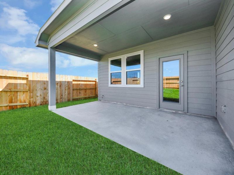 Exterior details and patio area of a home in Emberly, Beasley (Image 25).