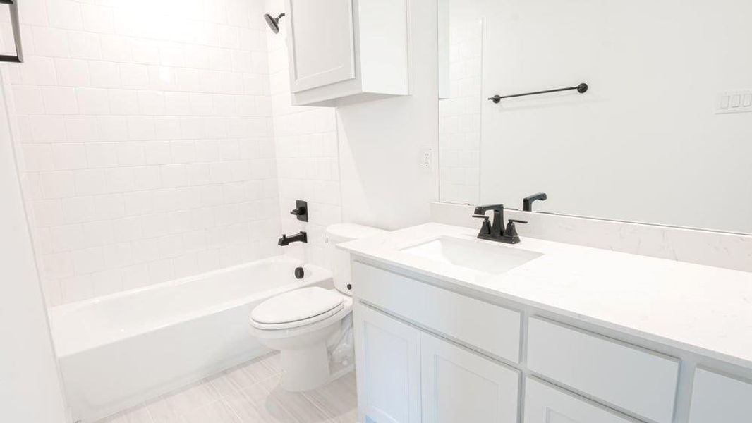 Furnished interior view inside a new home in The Abbey at Mercer Crossing, Farmers Branch (Image 15).