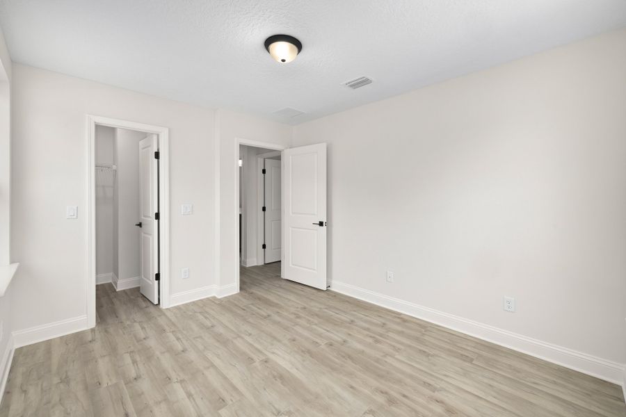 Representative unfurnished interior of a home built from the Palmetto by Riverside Homes in Mariposa at EverRange 40' Series, Jacksonville (Image 117).