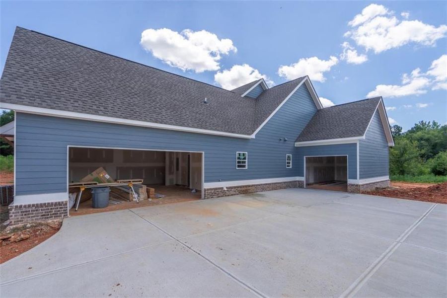 Front exterior of a new home in , Social Circle, GA, highlighting curb appeal (Image 3).
