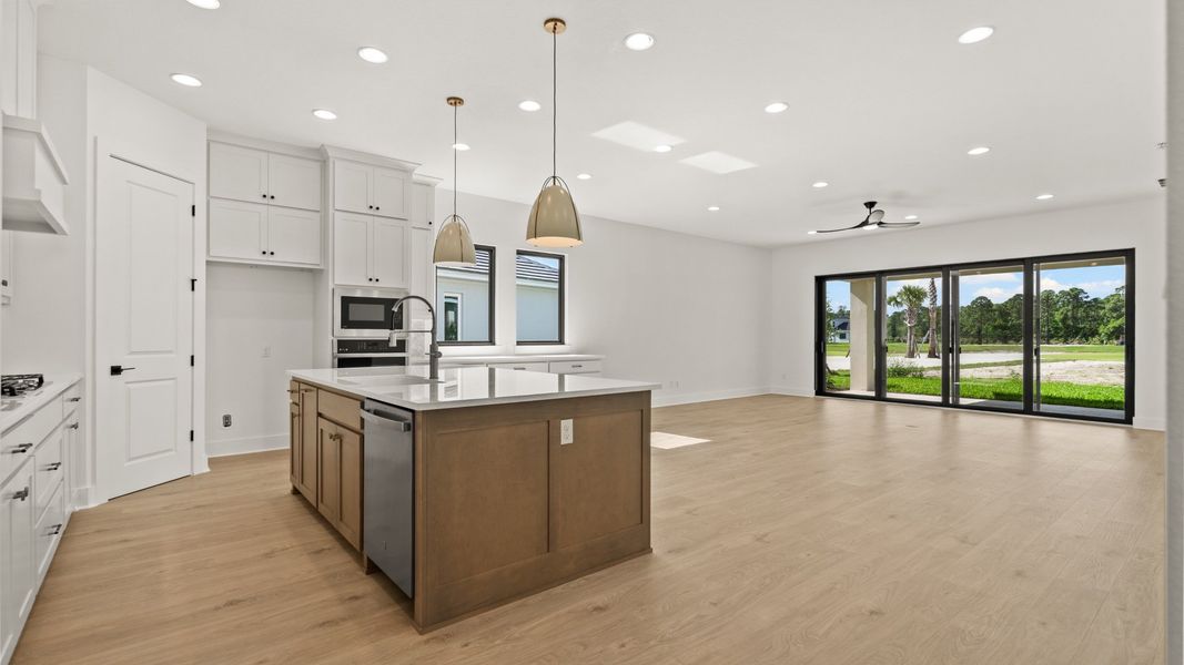 Furnished interior view inside a new home in Glynlea Country Club, Port St. Lucie (Image 5).