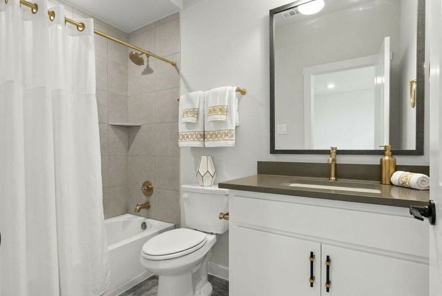 Furnished interior view inside a new home in Cottonwood Creek, Rowlett (Image 35).