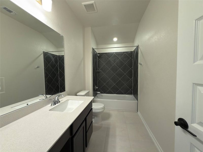 Furnished interior view inside a new home in River Bluff, Leander (Image 11).