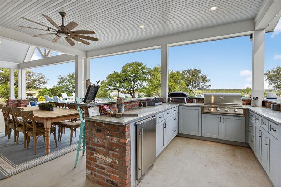 Prepare those excellent, outdoor meals from this outdoor kitchen. Who needs to ever leave this home for a vacation? This place is a RESORT!