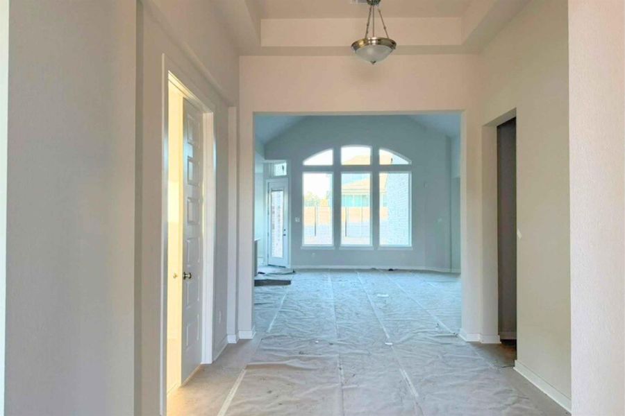 Hall featuring baseboards