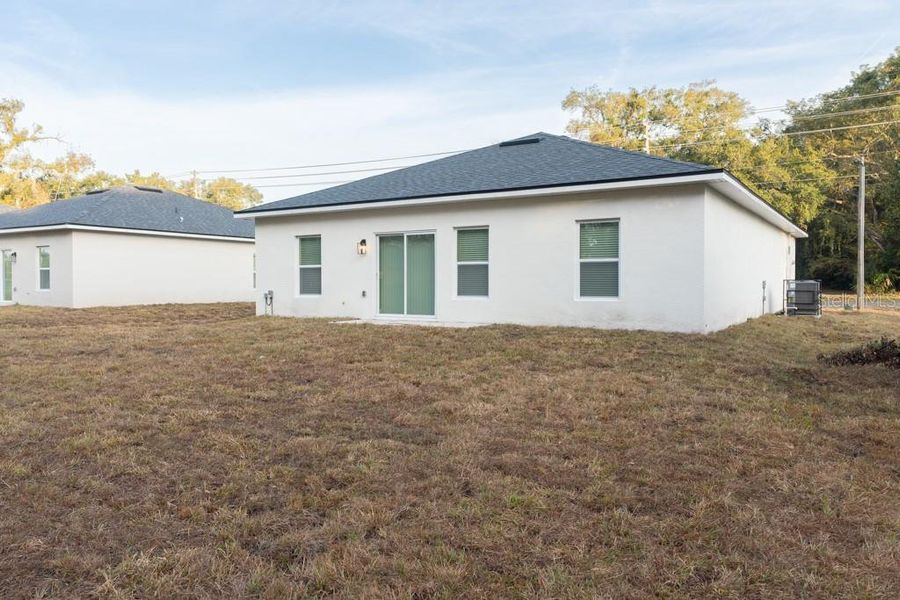 Exterior details and patio area of a home in , Apopka (Image 4). Exterior details and patio area of a home in , Apopka (Image 4).