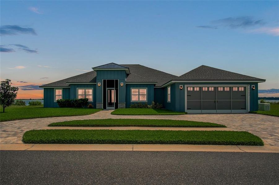Front exterior of a new home in , Auburndale, FL, highlighting curb appeal (Image 2).