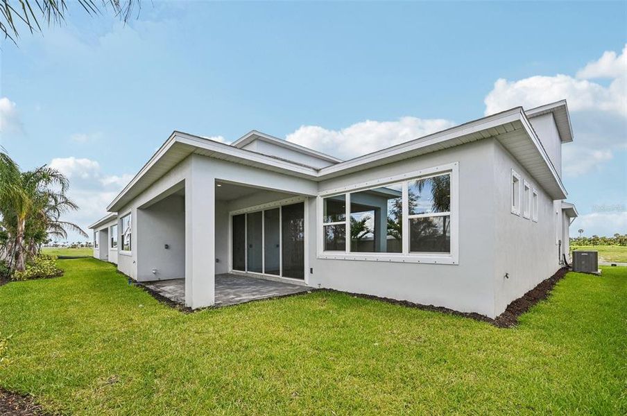Exterior details and patio area of a home in Biscayne Landing at Seaire, Parrish (Image 23).