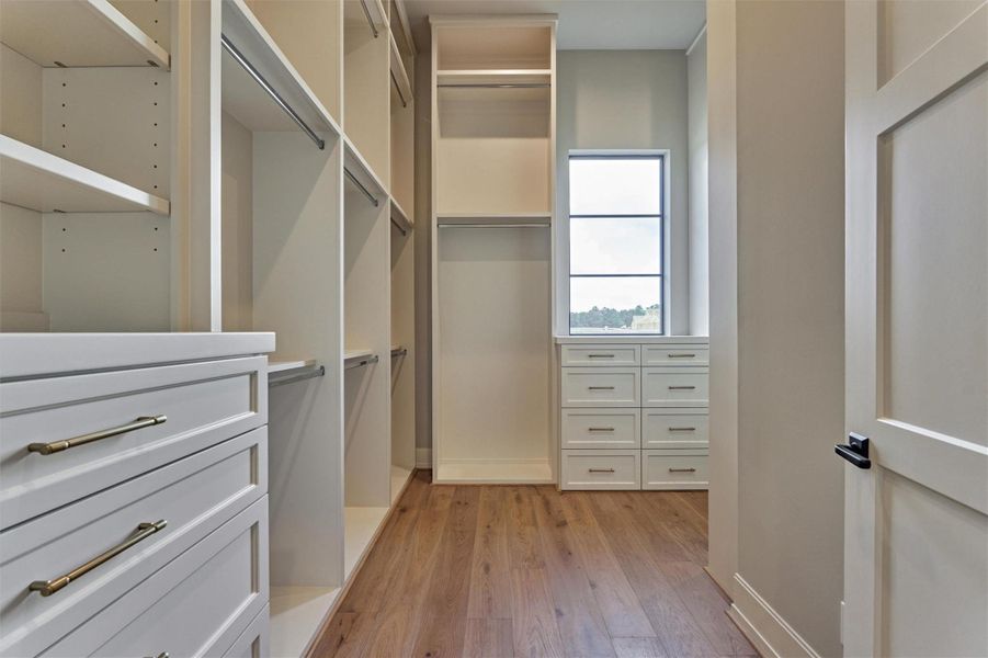 Massive primary closet with built-ins. Massive primary closet with built-ins.