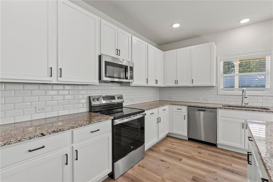 Furnished interior view inside a new home in , Auburn (Image 9).