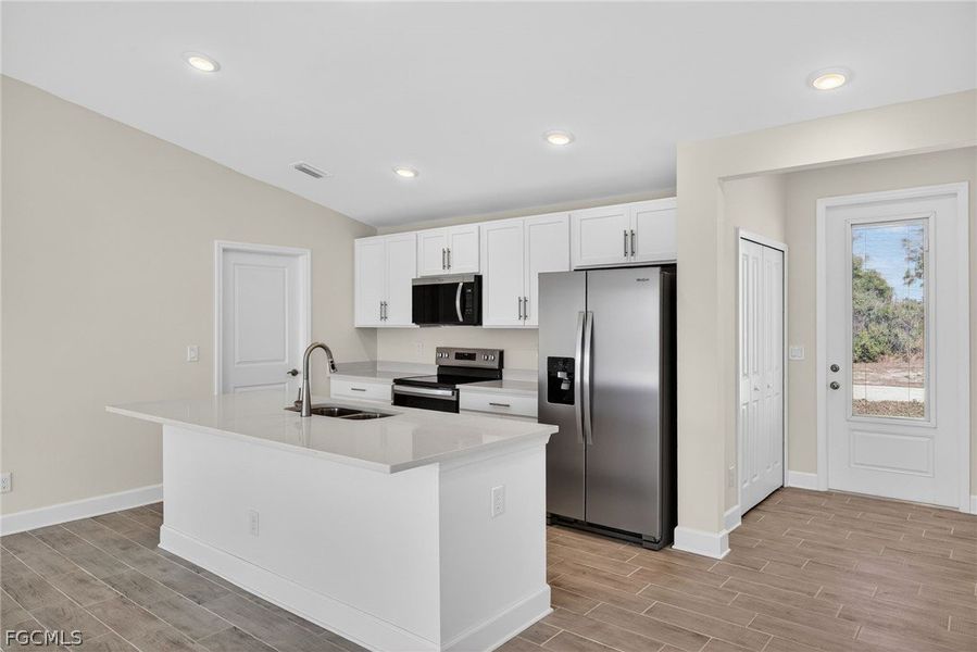 Furnished interior view inside a new home in Cape Coral, Cape Coral (Image 9). Furnished interior view inside a new home in Cape Coral, Cape Coral (Image 9).