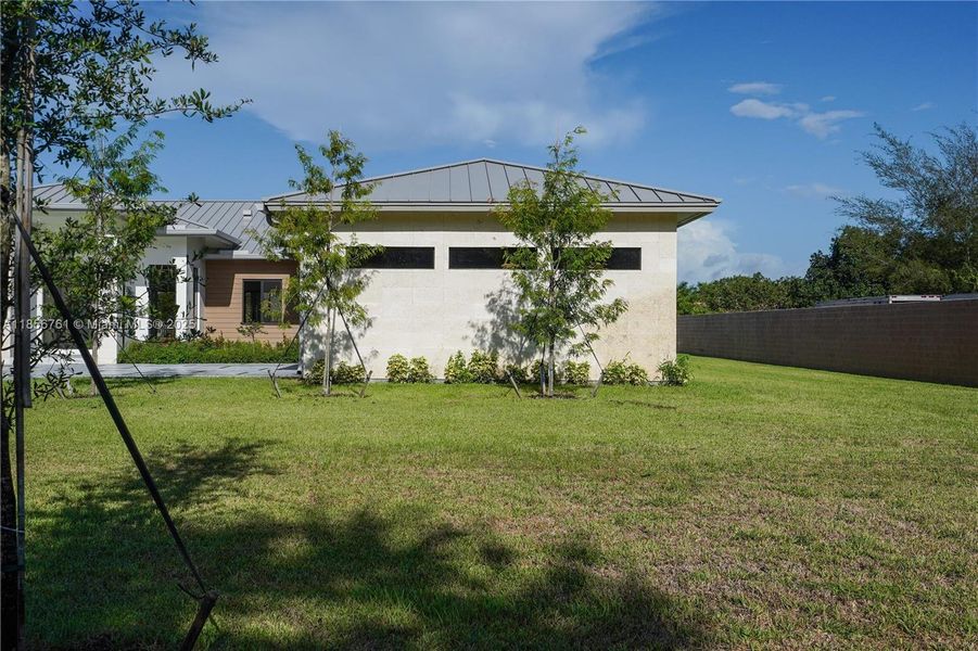 Front exterior of a new home in , Homestead, FL, highlighting curb appeal (Image 42).