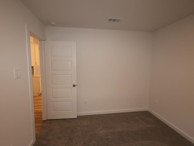 Spacious, unfurnished interior of a new home in Pinewood at Grand Texas, New Caney (Image 13).