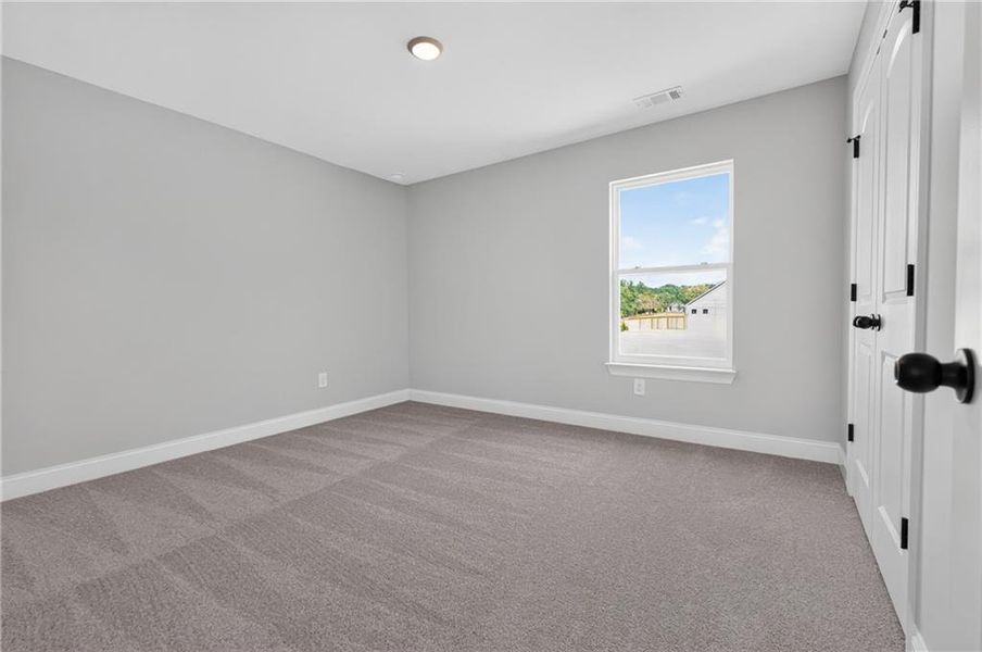 Spacious, unfurnished interior of a new home in , Loganville (Image 59).