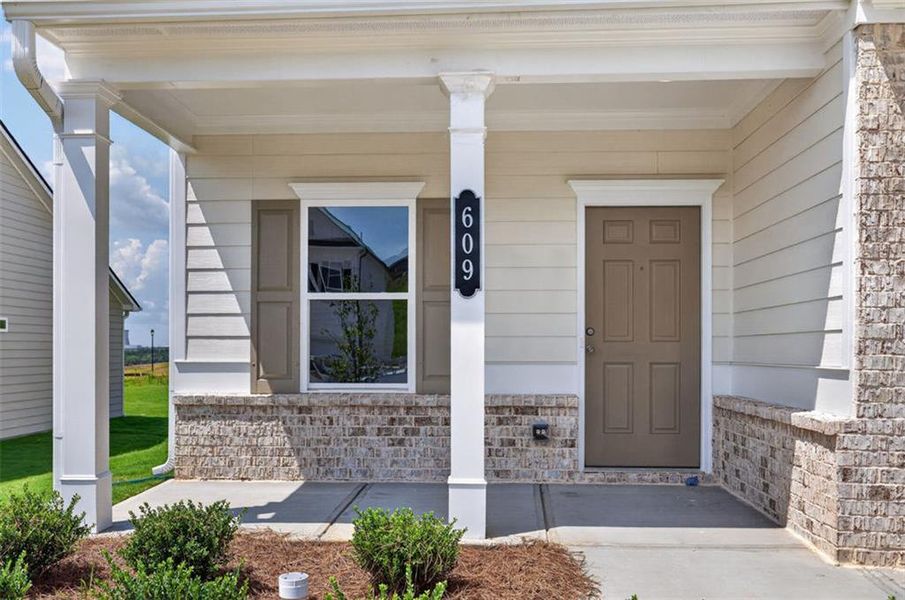 Exterior details and patio area of a home in The Stiles, Cartersville (Image 24).