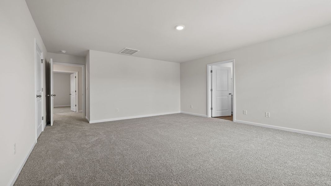 Spacious, unfurnished interior of a new home in Village Grove, Greenville (Image 25).