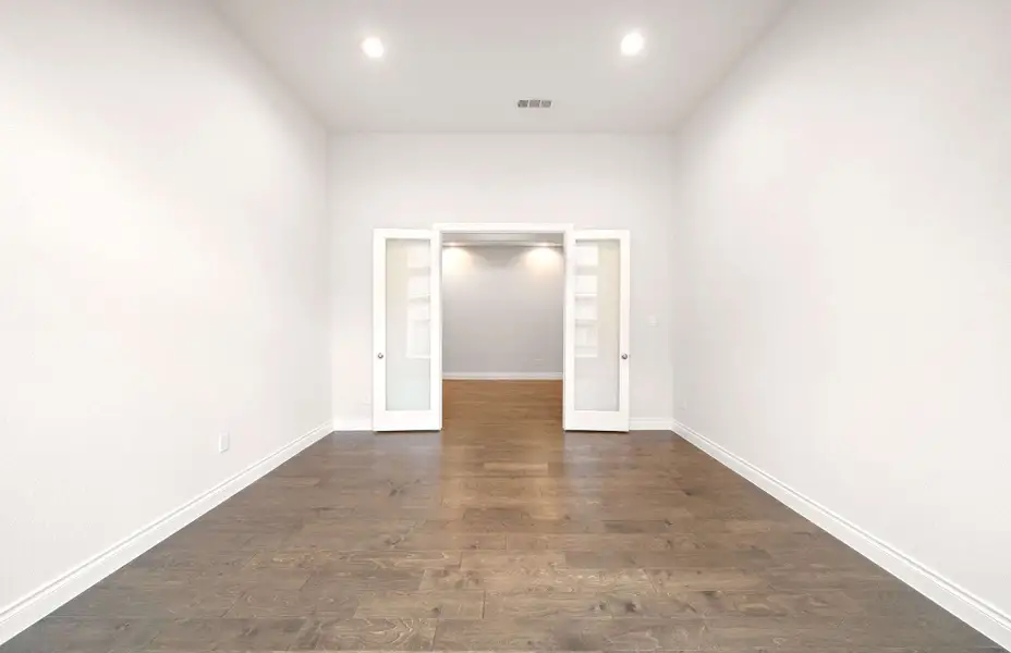 Representative unfurnished interior of a home built from the 3068 by Ravenna Homes in The Woodlands Hills 65′, Willis (Image 23).