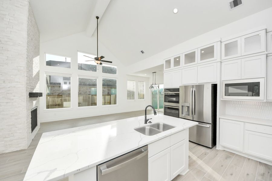 Furnished interior view inside a new home in Meridiana, Manvel (Image 9).