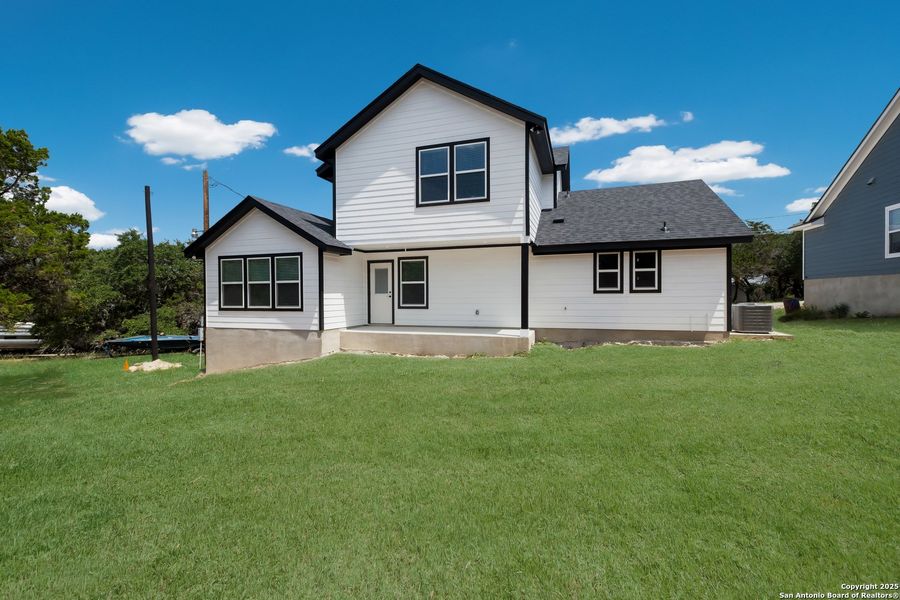 Exterior details and patio area of a home in , Lakehills (Image 19).