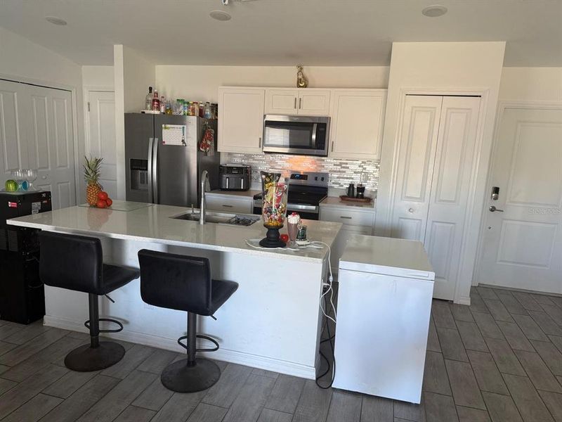 Furnished interior view inside a new home in , Cape Coral (Image 6). Furnished interior view inside a new home in , Cape Coral (Image 6).