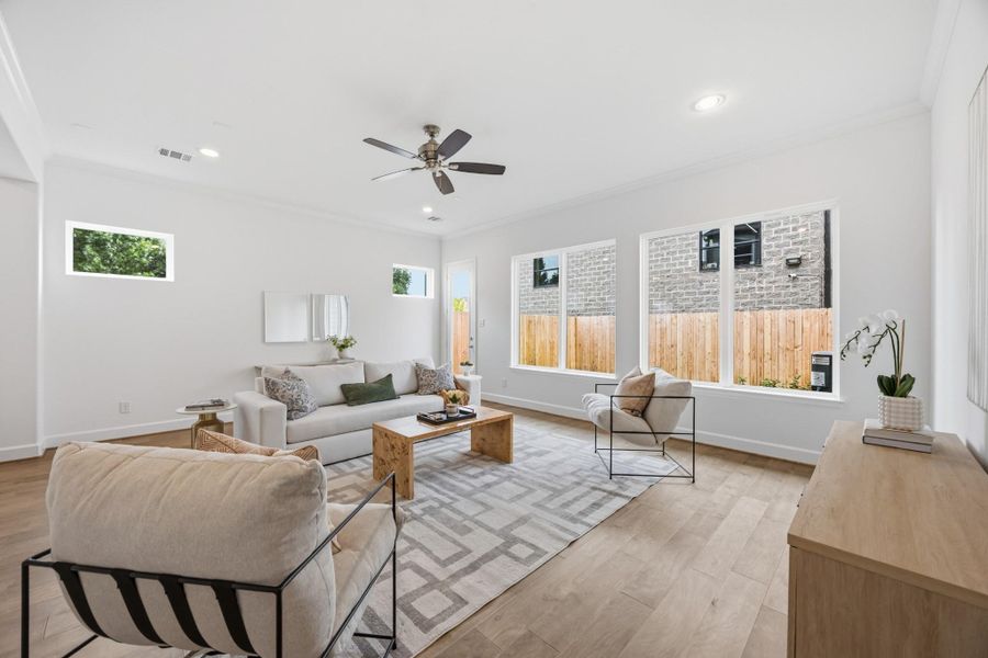 Natural Beauty: Enjoy the tranquility of your backyard views, enhanced by the optimal comfort of a thoughtfully included standard ceiling fan.