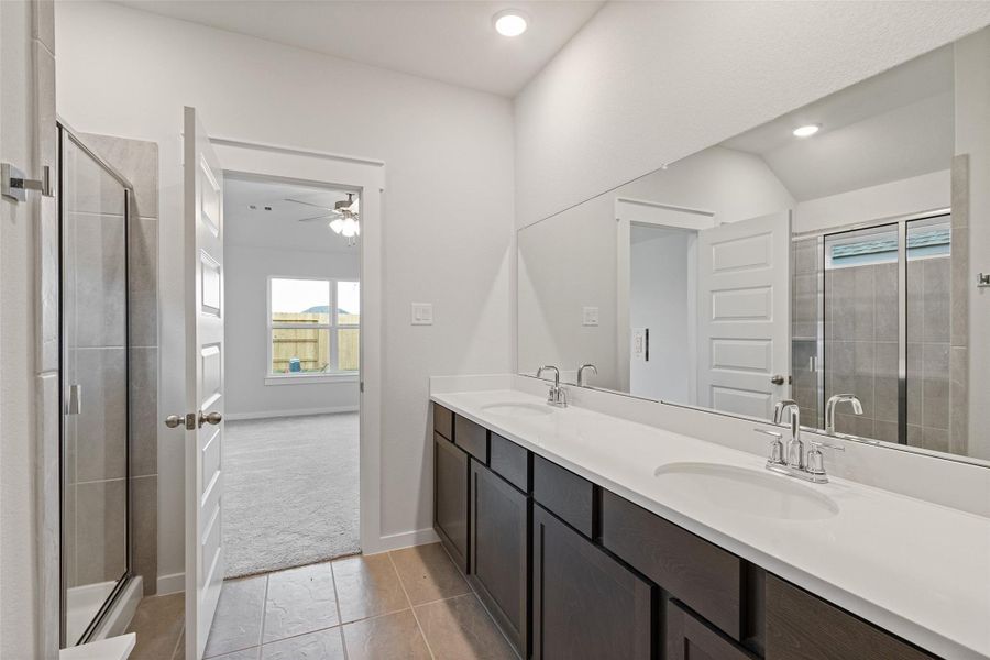 Furnished interior view inside a new home in Sunterra, Katy (Image 10).