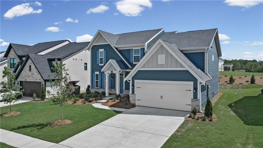 Front exterior of a new home in Twin Lakes, Hoschton, GA, highlighting curb appeal (Image 20).