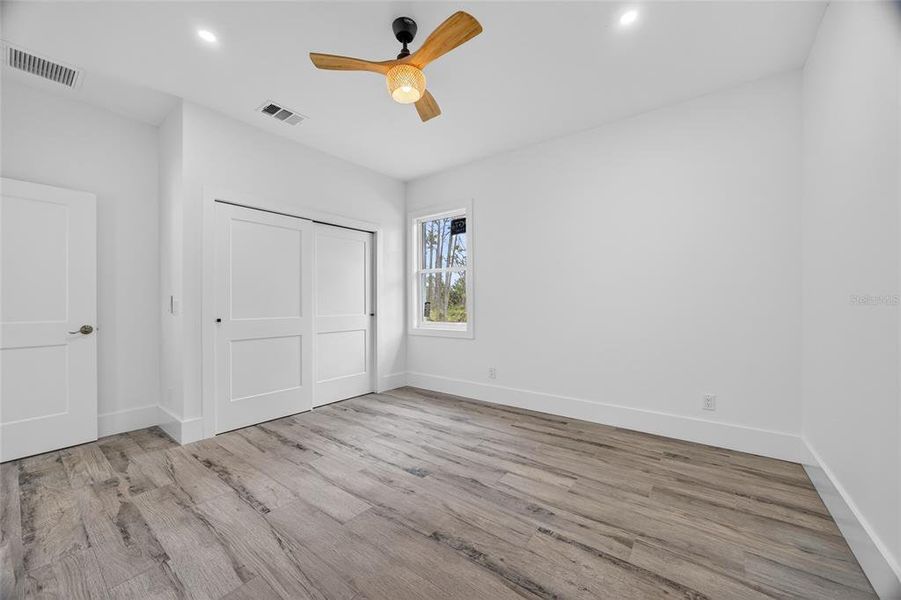 Spacious, unfurnished interior of a new home in , Port Charlotte (Image 32).