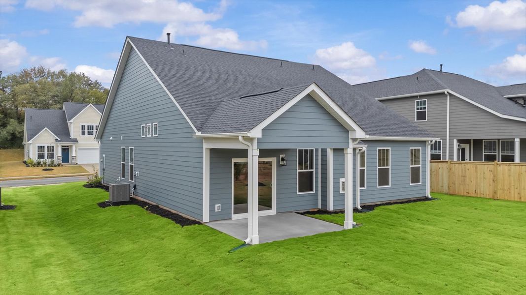 Warm and inviting outdoor living space with a covered rear porch and tasteful finishes Warm and inviting outdoor living space with a covered rear porch and tasteful finishes
