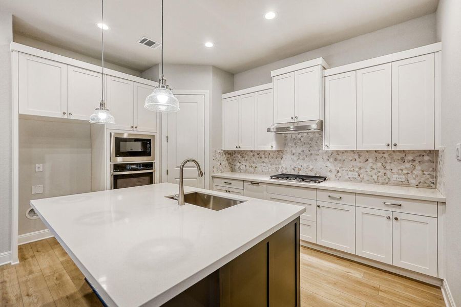 Furnished interior view inside a new home in 6 Creeks, Kyle (Image 7).