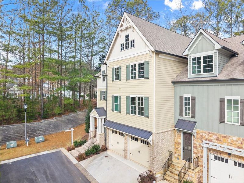 Front exterior of a new home in , Canton, GA, highlighting curb appeal (Image 22).