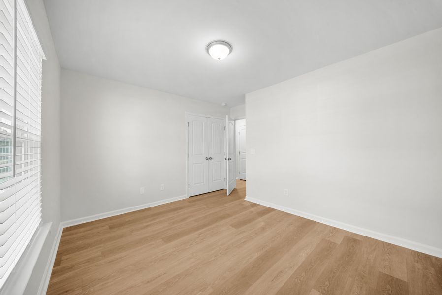 Representative unfurnished interior of a home built from the The Holly by Smith Family Homes in Belair East, Statesboro (Image 22).