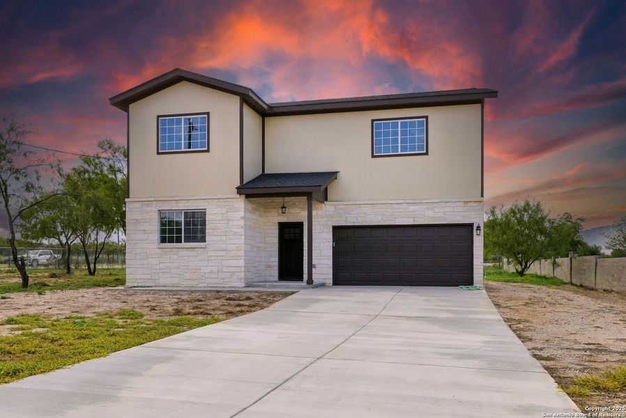 Front exterior of a new home in , Lytle, TX, highlighting curb appeal (Image 25). Front exterior of a new home in , Lytle, TX, highlighting curb appeal (Image 25).