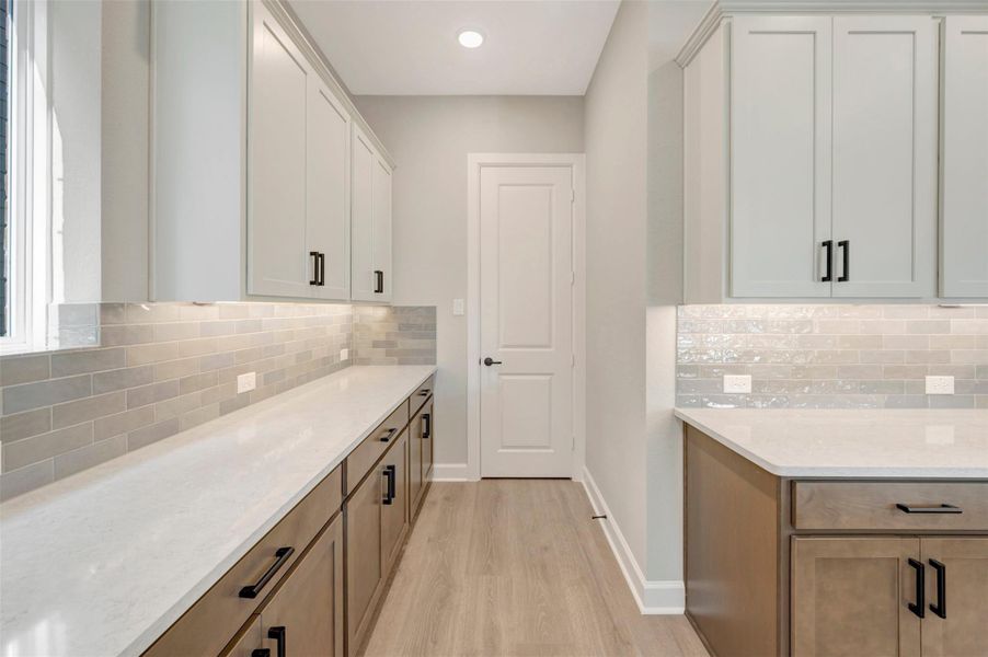 Furnished interior view inside a new home in Pomona - Grove Row Collection, Manvel (Image 12).