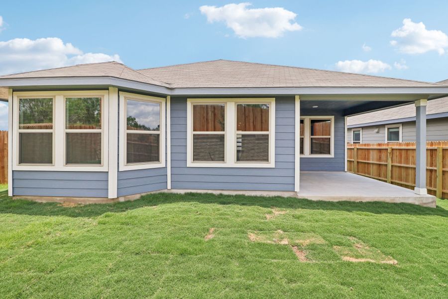 Back exterior of the Callaghan floorplan at a Meritage Homes community.