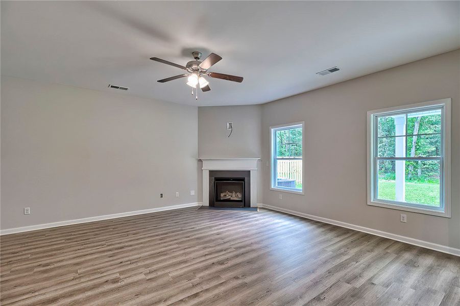 This inviting living room features a cozy fireplac