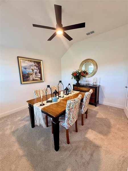 Vaulted ceiling with a contemporary black ceiling fan featuring integrated lighting Vaulted ceiling with a contemporary black ceiling fan featuring integrated lighting