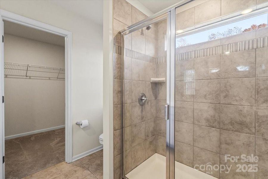 large primary bathroom and shower large primary bathroom and shower