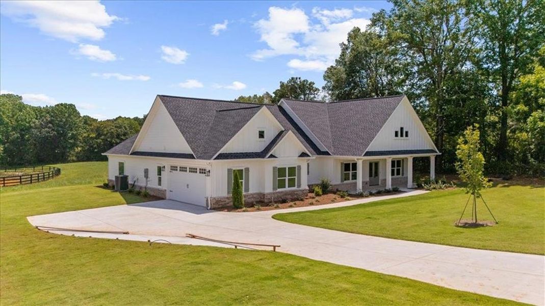 Front exterior of a new home in , Cumming, GA, highlighting curb appeal (Image 29).