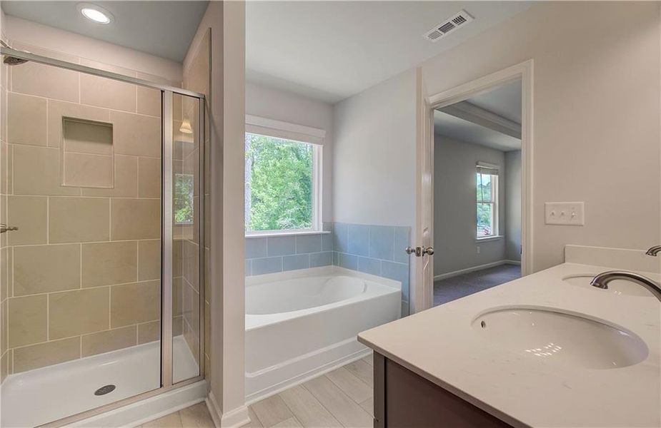 Furnished interior view inside a new home in Enclave at Evergreen, Fairburn (Image 11).