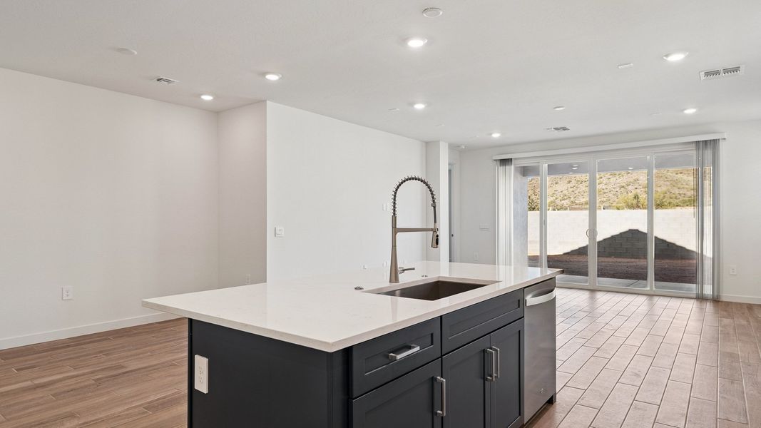 Representative furnished interior of a home built from the Hayden by D.R. Horton in The Ridge at Stone Butte, Phoenix (Image 11).