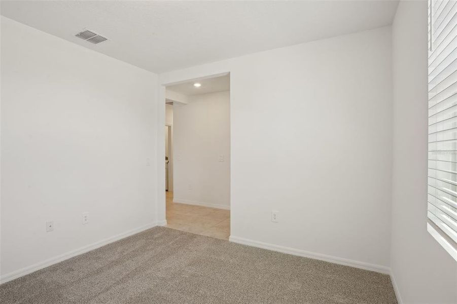 Spacious, unfurnished interior of a new home in Lake Deer Estates - Signature Series, Poinciana (Image 17). Spacious, unfurnished interior of a new home in Lake Deer Estates - Signature Series, Poinciana (Image 17).