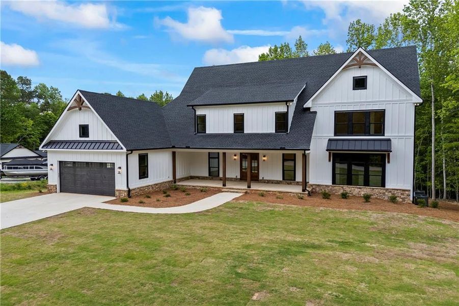Front exterior of a new home in , Flowery Branch, GA, highlighting curb appeal (Image 39).