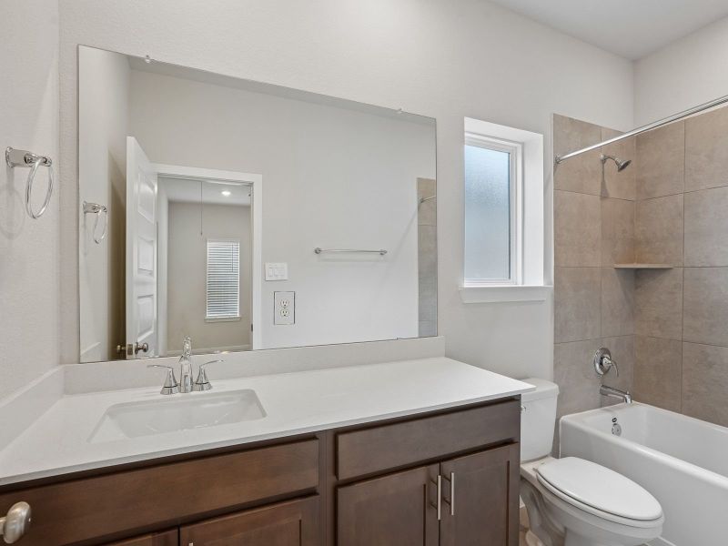 Furnished interior view inside a new home in Parkway Commons - City Series, Missouri City (Image 10).