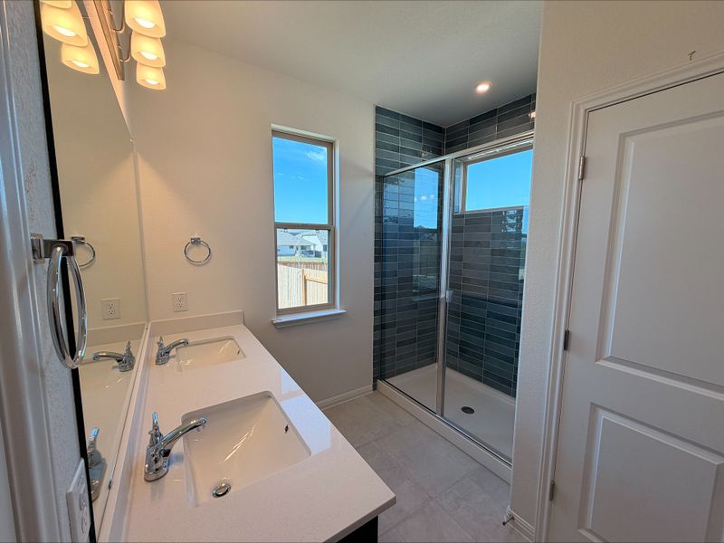 Furnished interior view inside a new home in Crosswinds, Buda (Image 4).